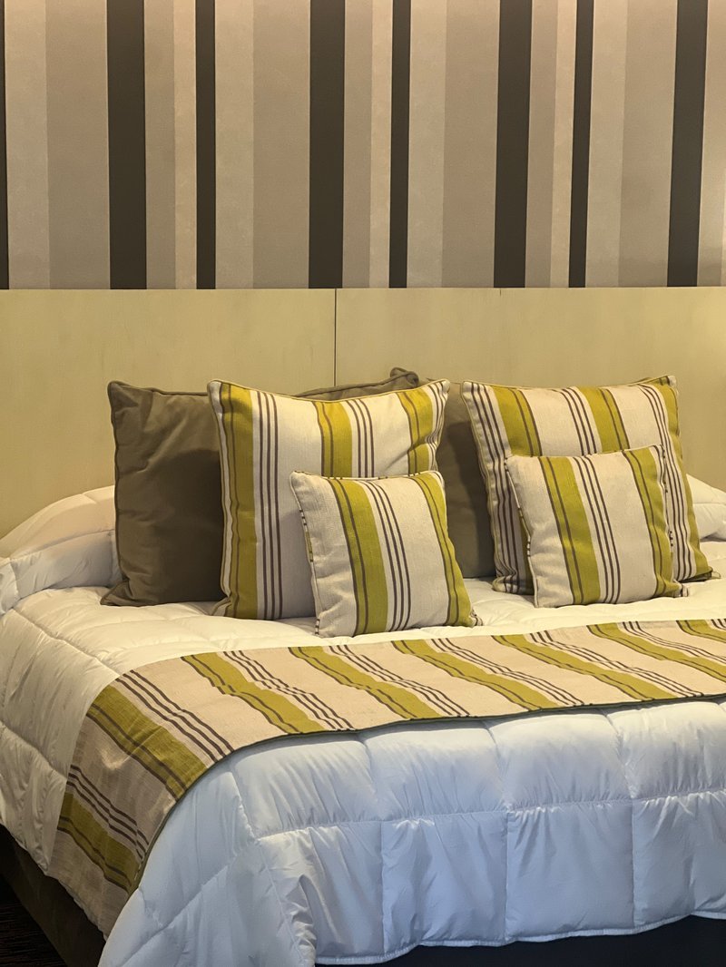 Detalle de la cama tendida